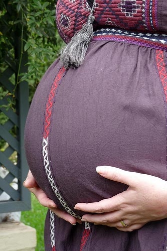 живот женщины на 32 неделе беременности